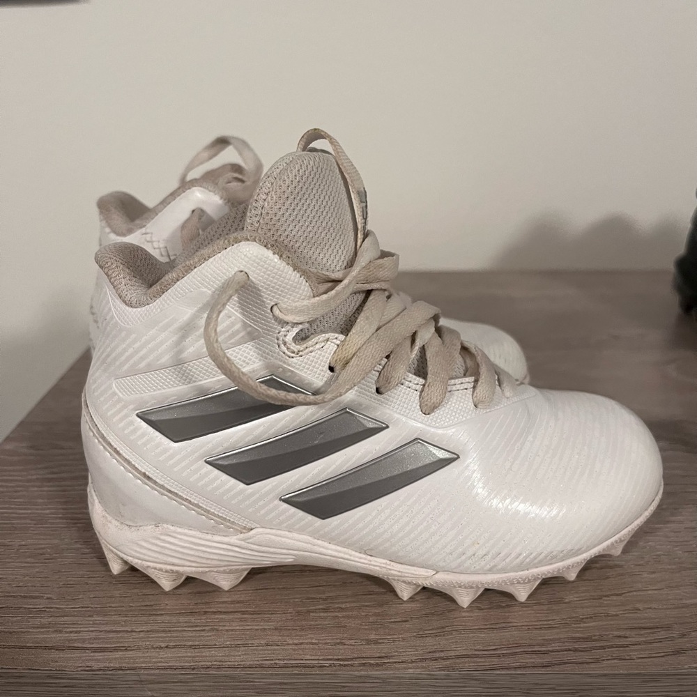 Size 10K football cleats.